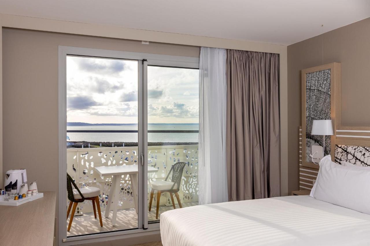 Deluxe Zimmer mit Kingsize-Bett, Balkon und Meerblick
