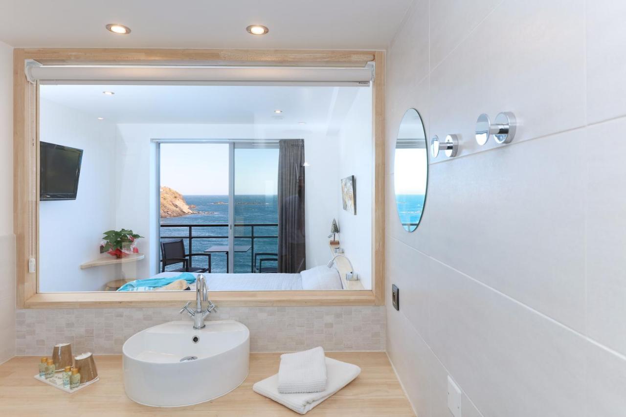 Habitación Triple con balcón y vistas al mar