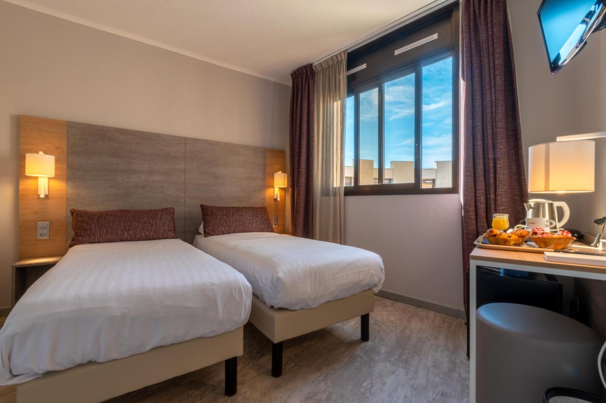 Standard Zweibettzimmer mit Blick auf den Innenhof