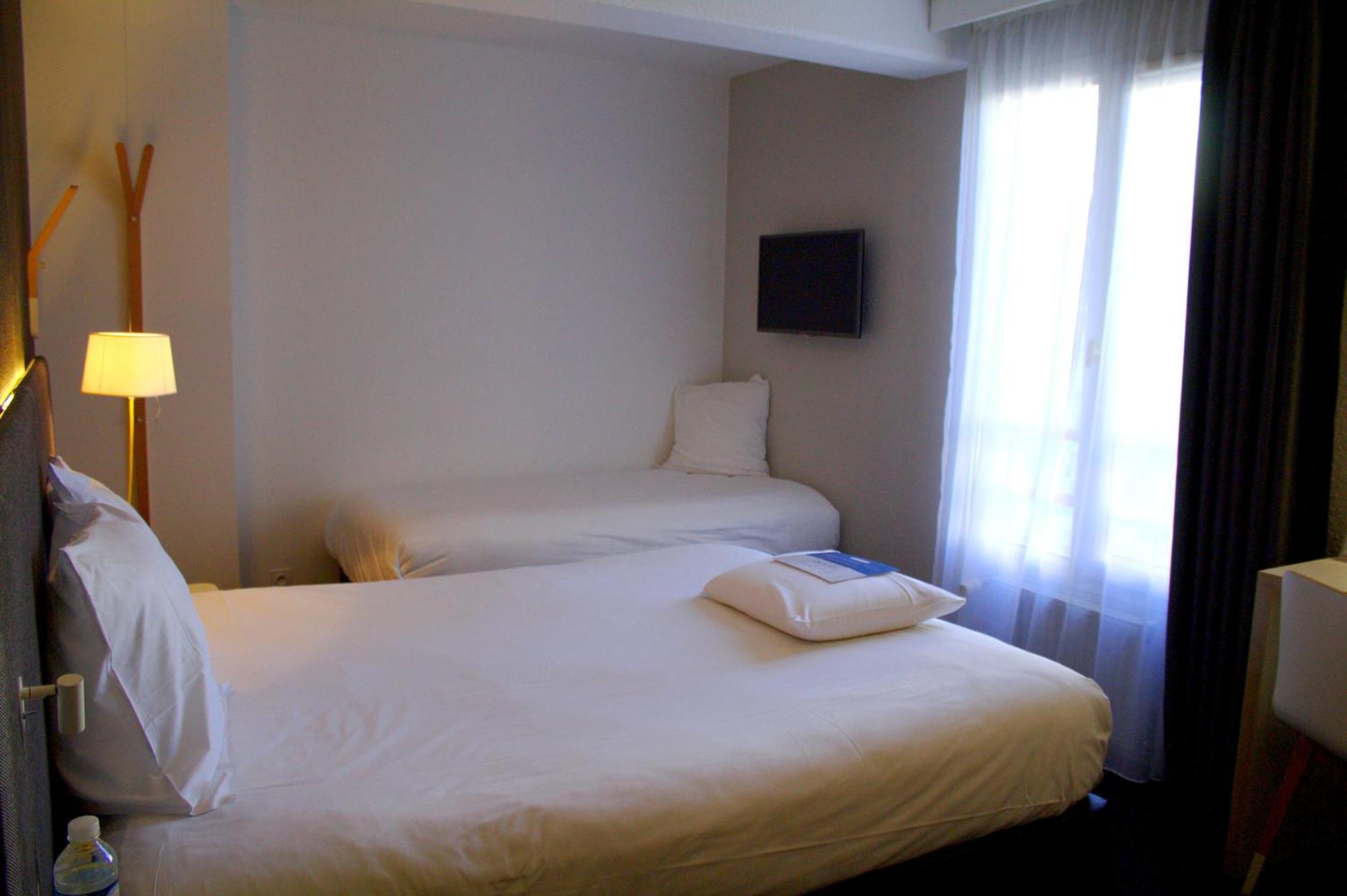 Chambre Triple avec 1 Lit Double et 1 Lit Simple