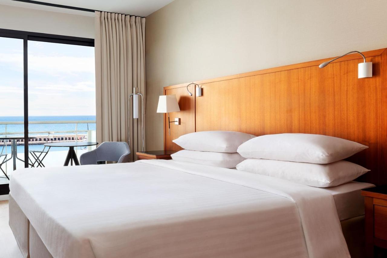 Business Doppelzimmer mit Meerblick und Balkon