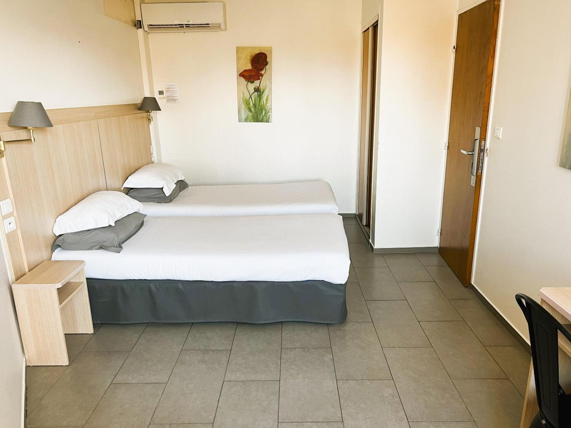 Two-Bedroom Family Suite (5 Adults)