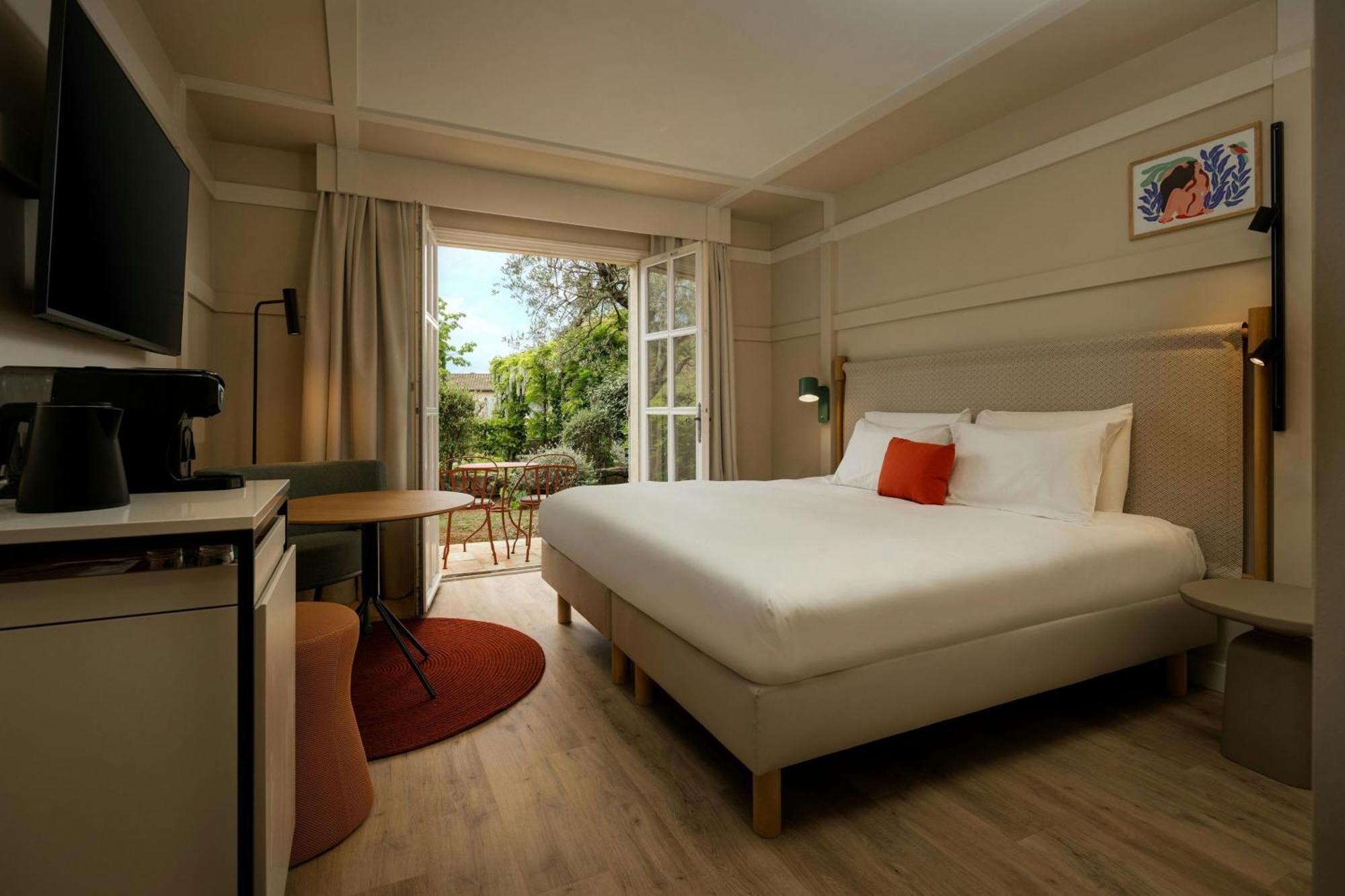 Deluxe Doppelzimmer mit Balkon und Gartenblick