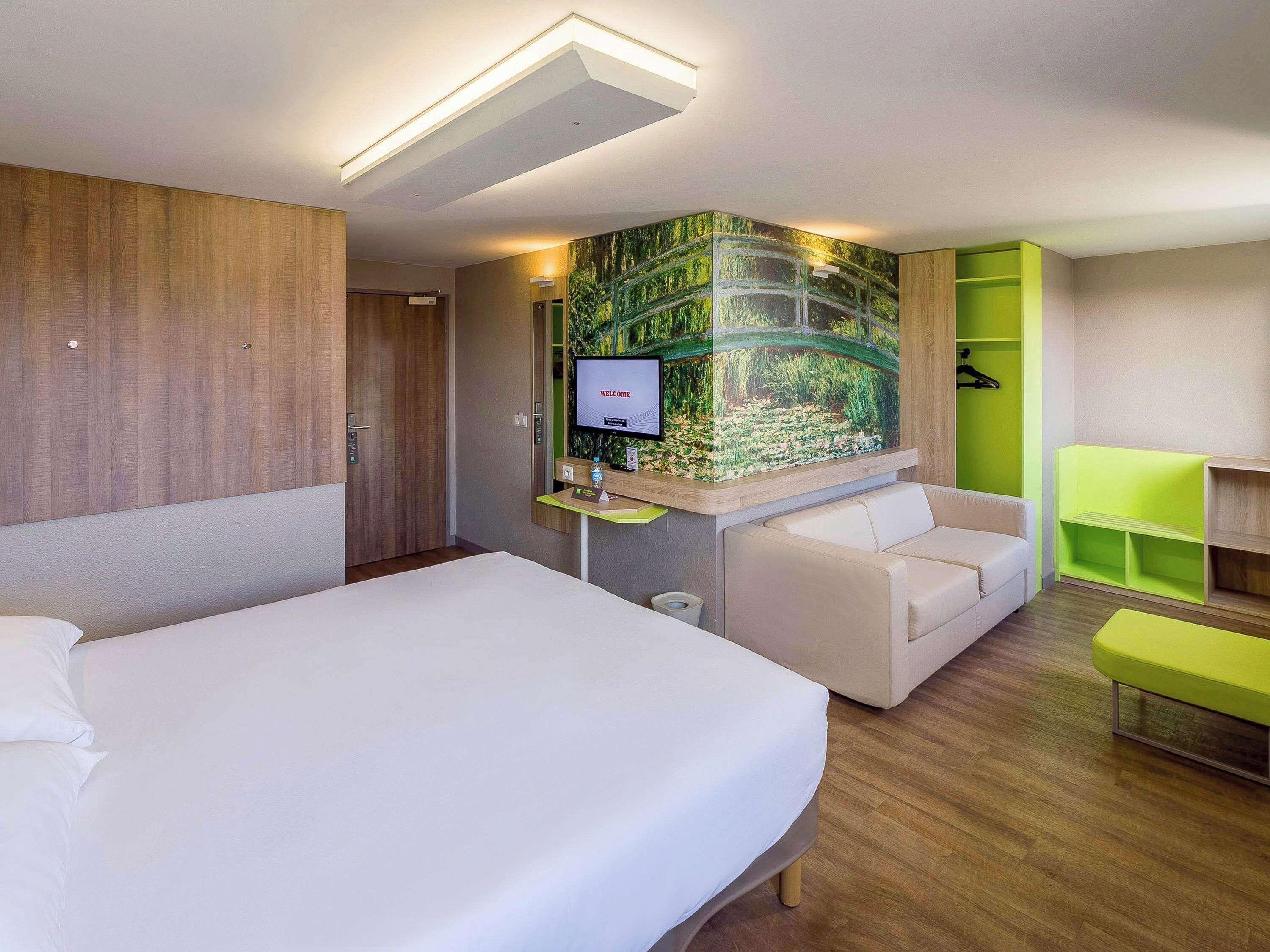 Standard Family Room with One double bed and Two sofa beds,1713030435:JPEG