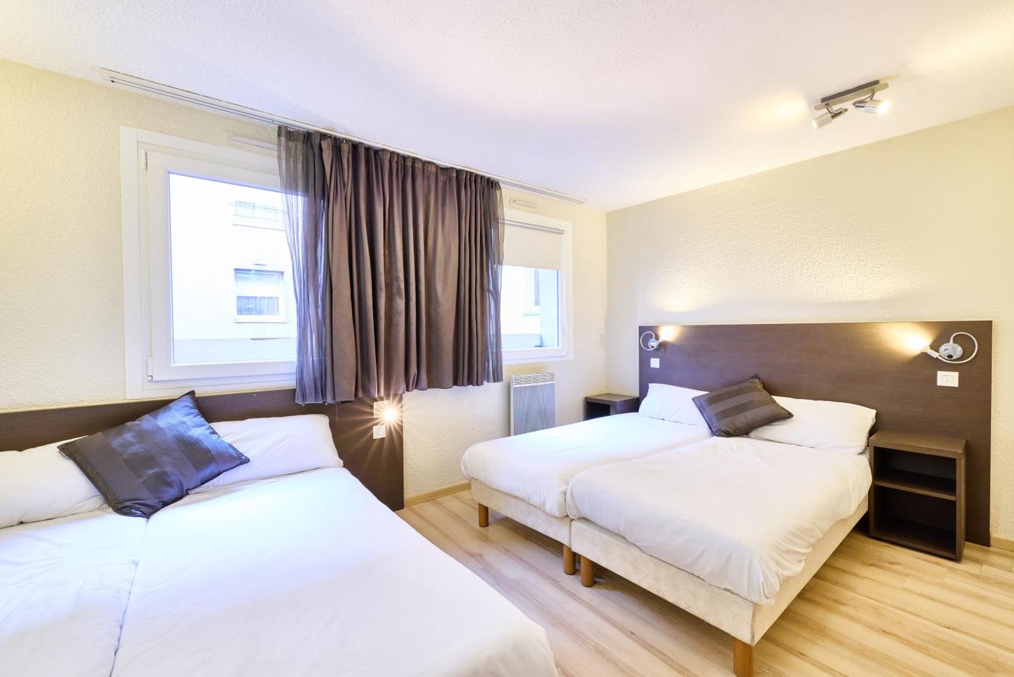 Quadruple Room 4 Single Beds