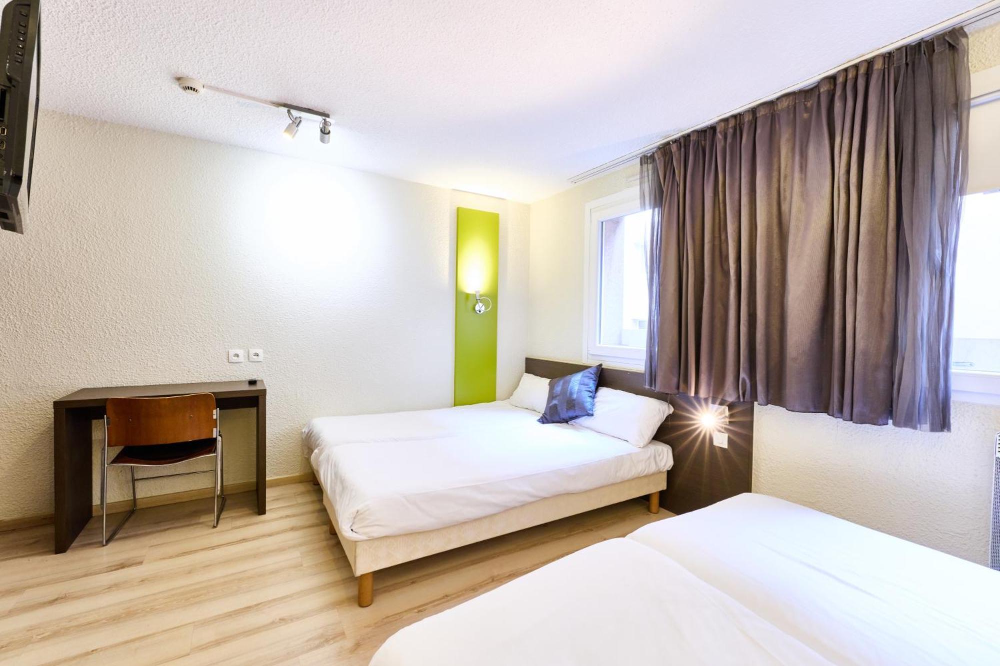 Quadruple Room 4 Single Beds