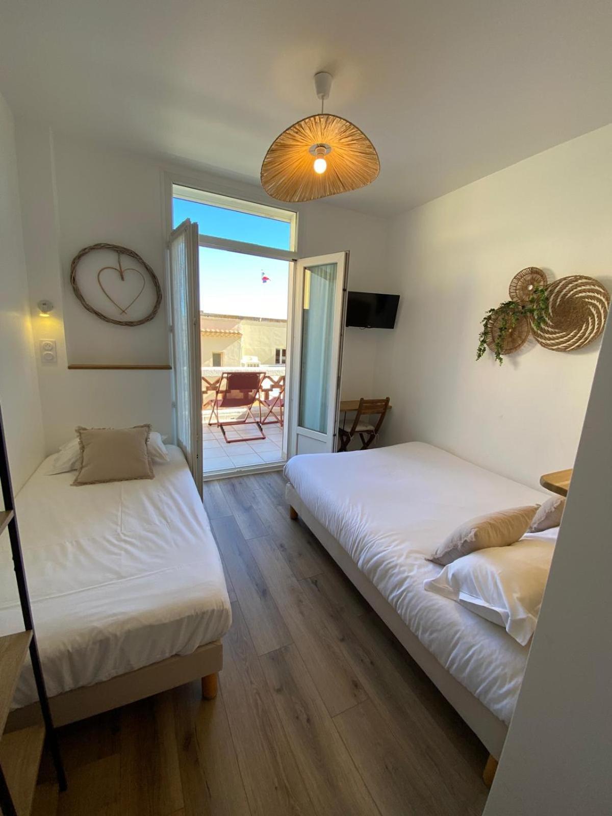 Chambre Triple avec Terrasse