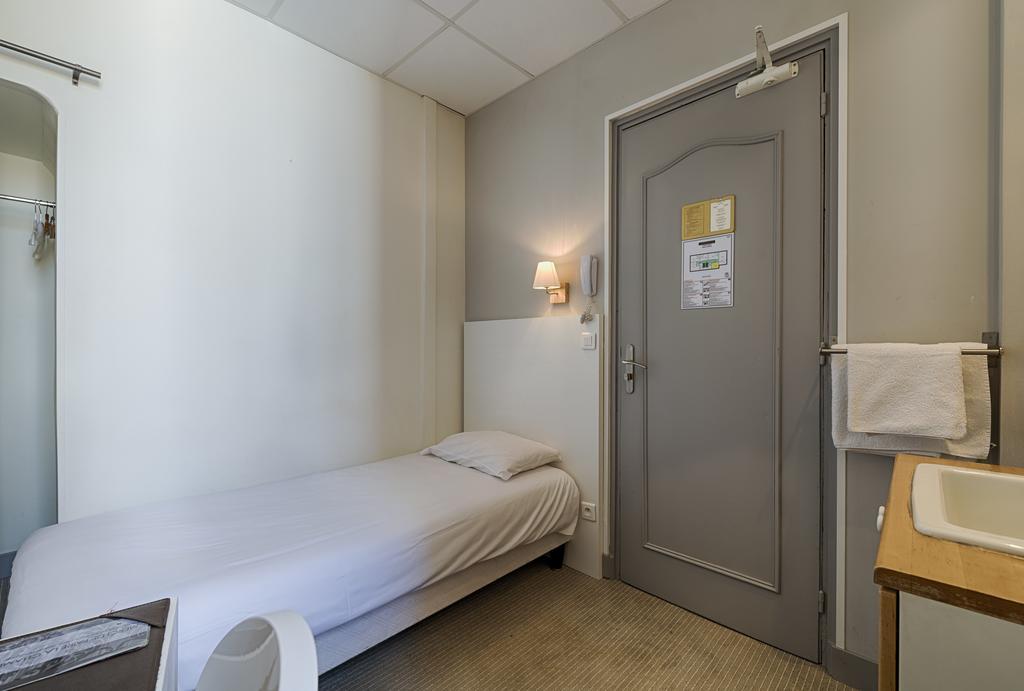 Eenpersoonskamer met Gedeelde Badkamer en Toilet