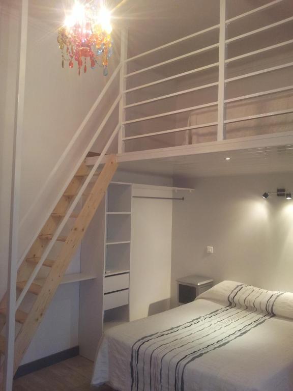 Triple Room Mezzanine with Balcony and Courtyard View