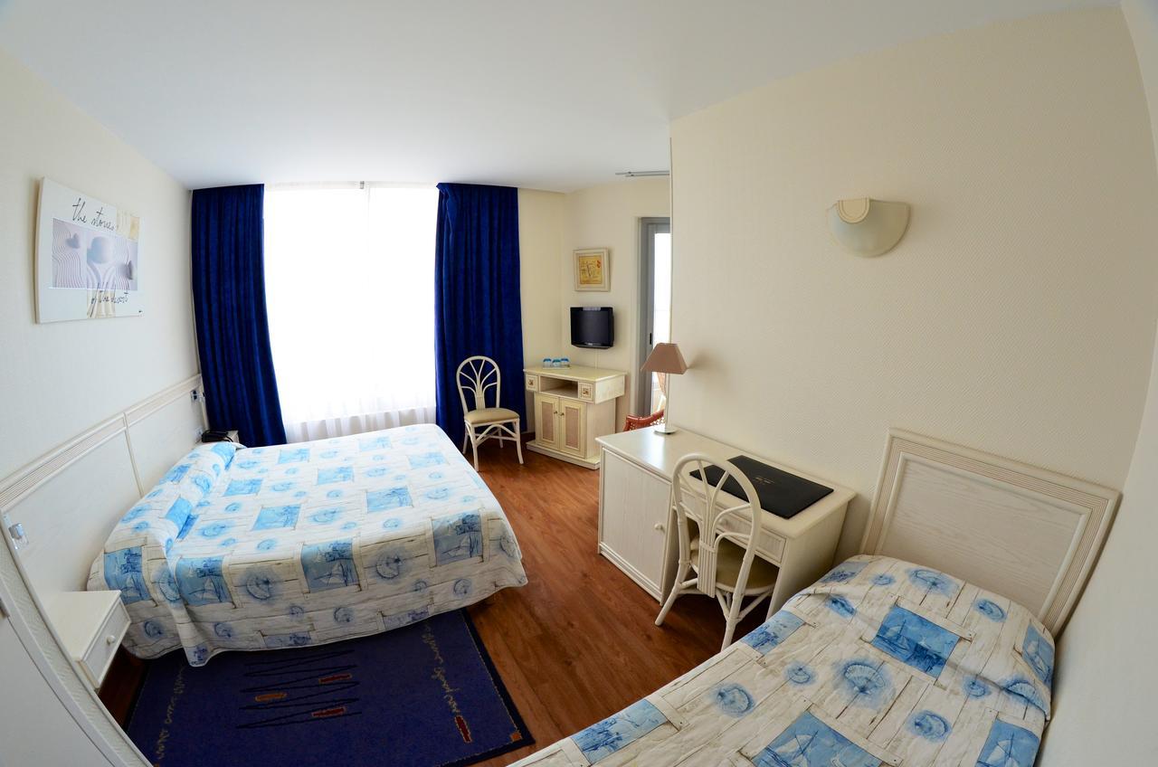 Dreibettzimmer mit Meerblick